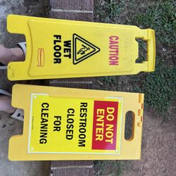 Wet Floor Signs And Restroom Closed
