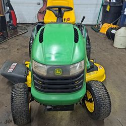 For Sale:04 John Deere L120 20HP with 48 Deck and Bagger for $1,400