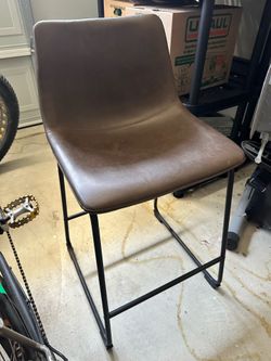 Brown leather barstools