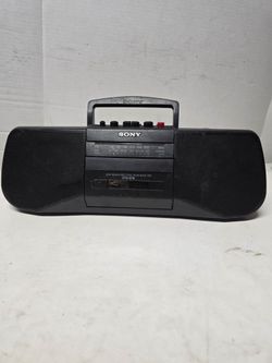vintage Sony CFS-B15 portable AM/FM radio cassette recorder.