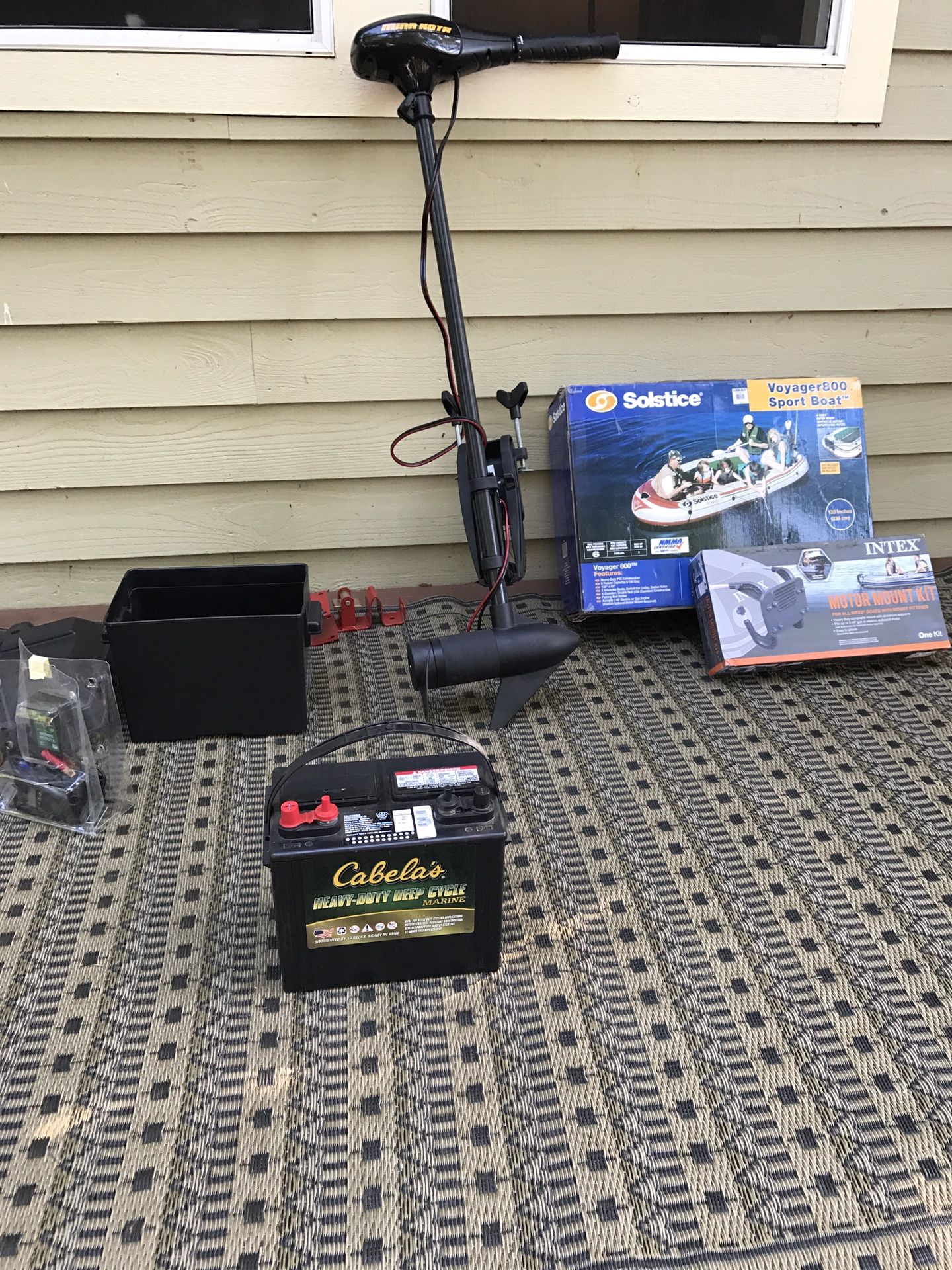 BRAND NEW 6 PERSON RAFT, TROLLING MOTOR, CABELA'S MARINE BATTERY, ECT...