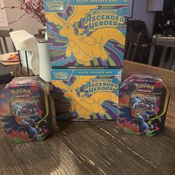 Ascended hero’s and mega charizard tin