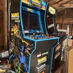 Arcade 1up With 10,000 Games With Riser.  Marvel Super Heroes