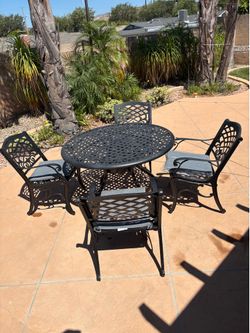 Patio  Furniture - Table, 4 Chairs, and Cushions