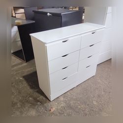 Eight drawers dresser with rails