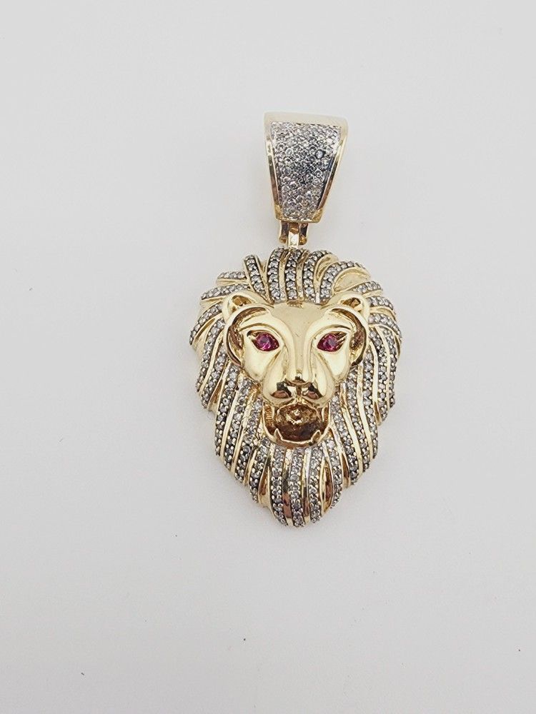 10k gold diamond & ruby lion pendant