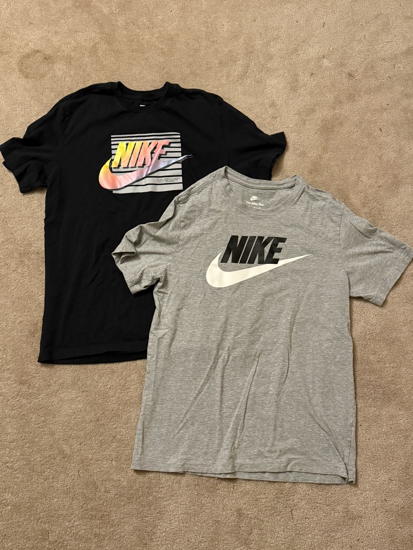 2 Medium Nike T-shirts