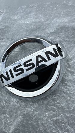 NEW Nissan Emblem Cut Out With Camera Hole 