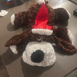 Christmas stuffed animal dog with sleepy eyes 