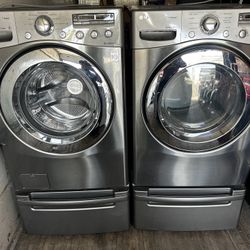 LG.  WASHER AND GAS DRYER 