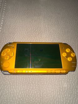 PlayStation portable bright yellow with 32gb sd