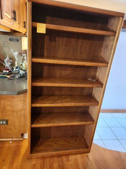 USED WOOD BOOKCASE WITH ADJUSTABLE SHELVES  72" HIGH X 36" WIDE X 10" DEEP  NEED GONE