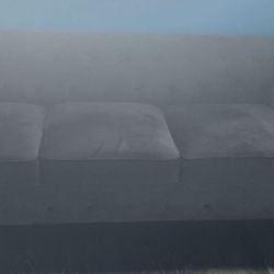 Black velvet sofa