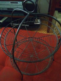 Black colored fruit holder