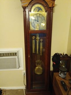 Nice grand father clock has its manual