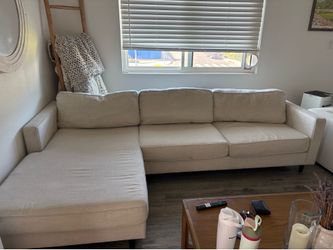 Beige Living Spaces couch in good condition