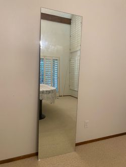 Large un framed mirror