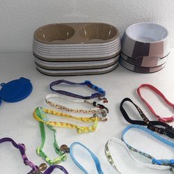 Cat bowls, collars, and pet hair cleaner all for grabs