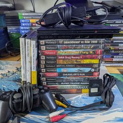 PS2 Slim with LARGE game Collection 