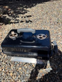 Used Weber Go‑Anywhere Portable Charcoal Grill in excellent used condition.