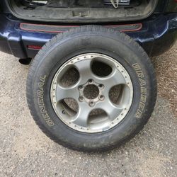 New Tire/w Rim (Nissan?)