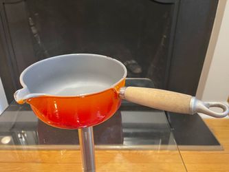 Vintage Le Creuset flame orange enameled cast iron saucepan
