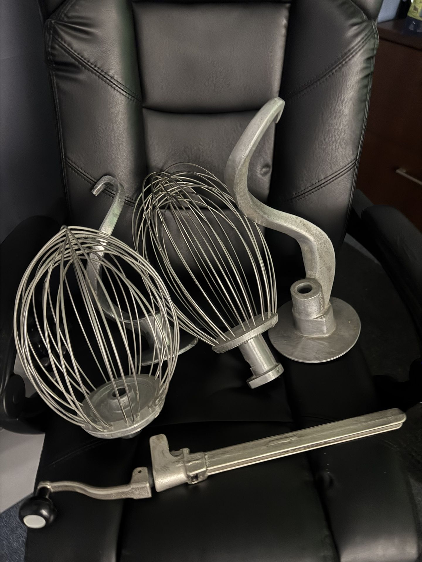 Set of Hobart commercial mixer attachments