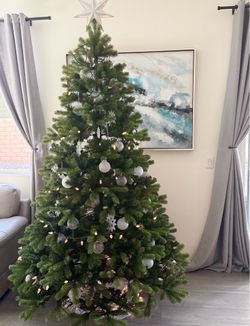 National Tree Company 7.5 ft Unlit Downswept Douglas Fir Artificial Christmas Tree, 1,867 Tips, Includes Stand,  and decorations Green