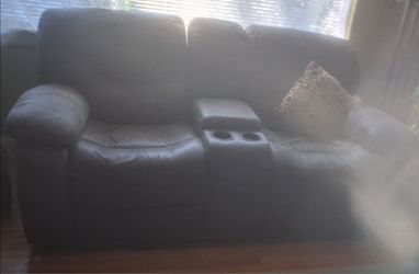 couch recliner with arm rest storage and two cup holders
