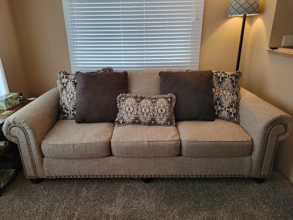 Comfortable, Ashley Sofa and Chair Set.