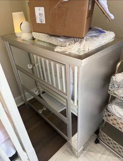 Mirrored three drawer cabinet
