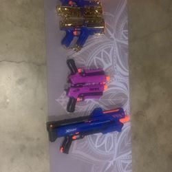 Nerf guns the two golden Xshots Are Ten Same With The Purple Ones But They Are 5 Dollars Each