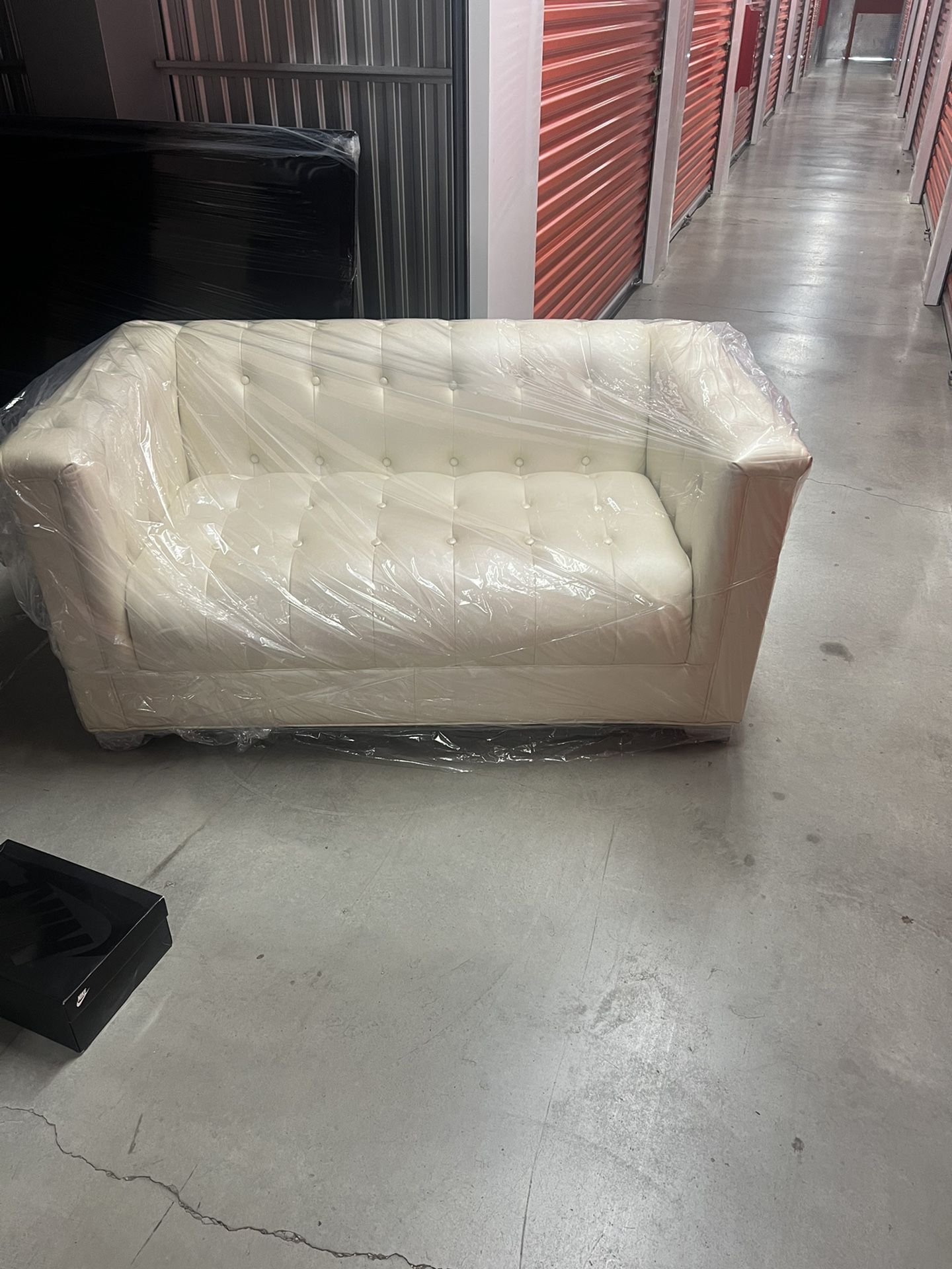 White Leather Couch and Love Seat ……