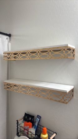 White Floating Shelves with Gold Ornate Metal