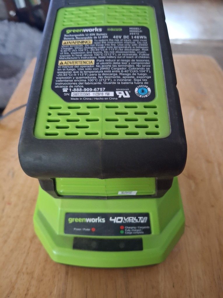 Green works g max forty volt battery and charger $60.00 Electronics & Media