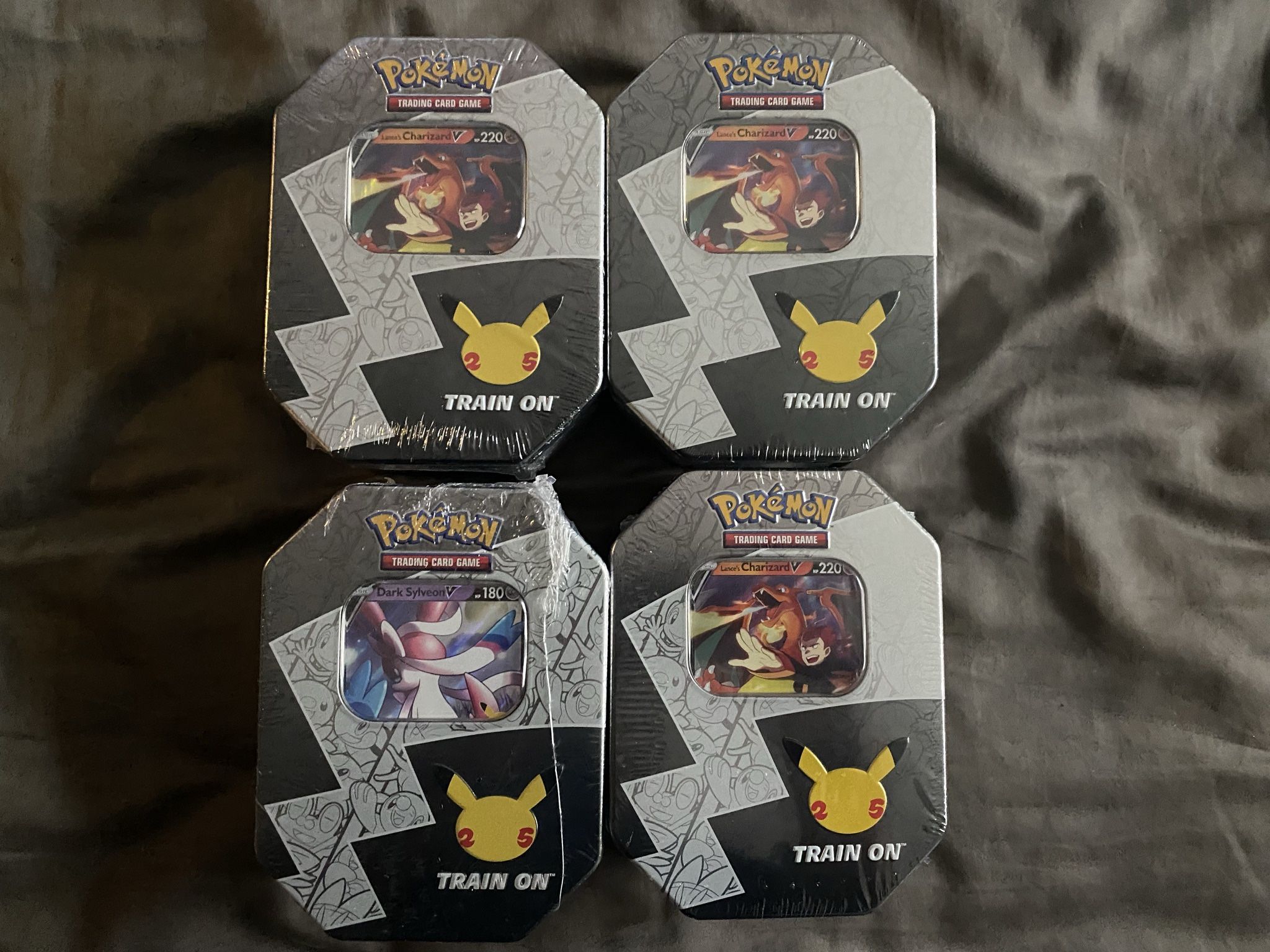 Pokemon Celebrations Trading Cards 25th Anniversary Tin Charizard Sylveon