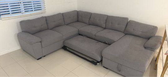FREE Gray Sectional Sofa with Pull-Out Sleeper