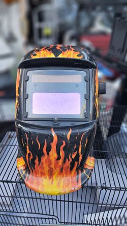Casco de soldadura con oscurecimiento automático de calavera llameante