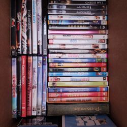 VARIETY  OF DVD'S  AND FEW TAPE CASSETTES 