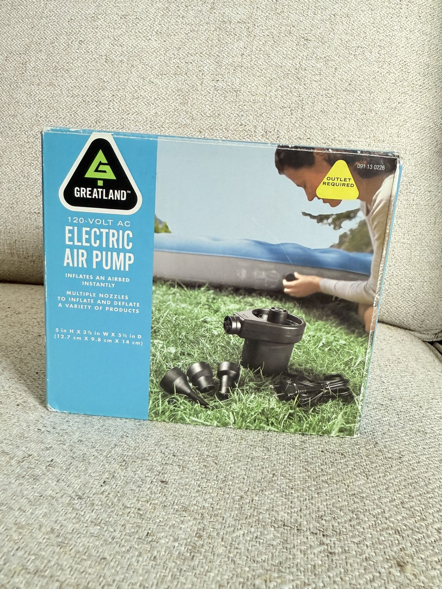 Portable Greatland 120-Volt AC Electric Air Pump. Designed to quickly inflate and deflate various inflatable items, such as air mattresses, pool float