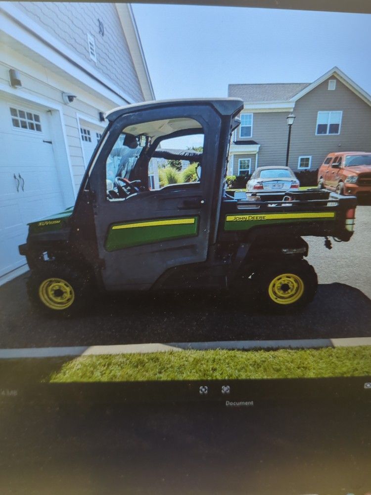 John Deere GatorXuv 835m W/ 6' Plow And Spreader