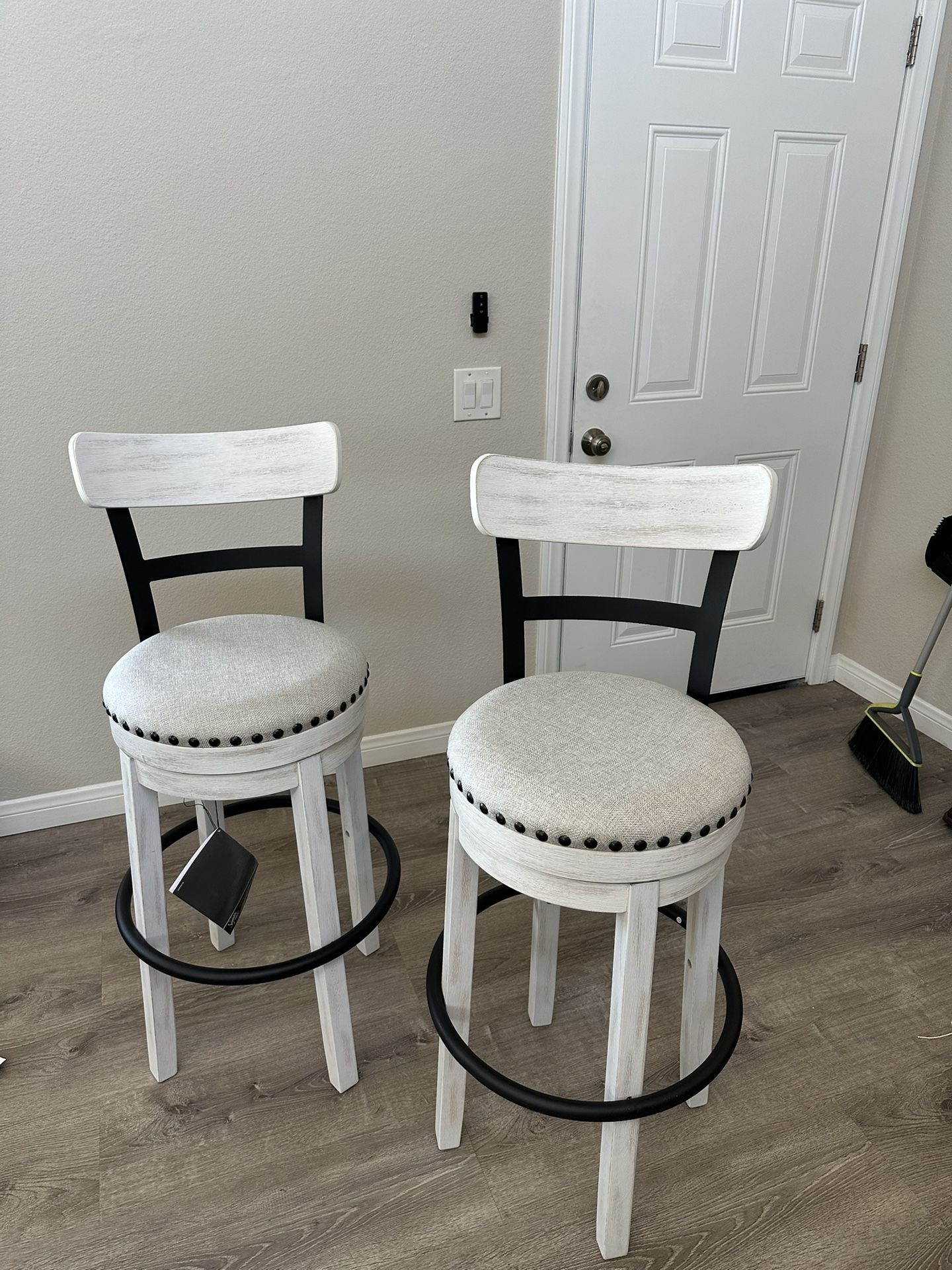 2 bar height swivel bar stools from Ashley Furniture