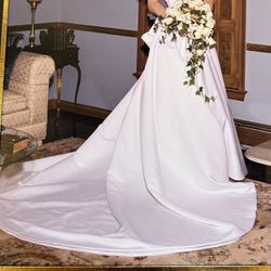 Wedding Dress Size 10. Still Available. Professionally cleaned and preserved and is like new. $225 or Best Offer