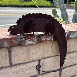 Metal chameleon sculpture