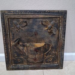 Set of wall art with a bee frame design included