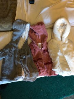 3 coats for 9-12 months girl. Like new. Never used