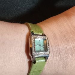 Ladies Light Green Fossil Watch With A Leather Band And Small Square Face 