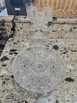 Set of 6 Anchor Hocking Wexford water glasses, made from antique clear glass stems with a 5-piece saucer