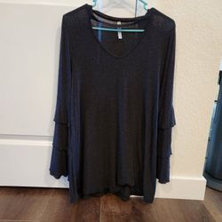 Long sleeve ruffled tunic in a dark gray color. size S, good condition  