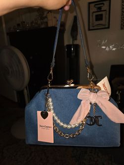 Juicy Couture Kiss Lock Denim purse. New with tags. Price firm